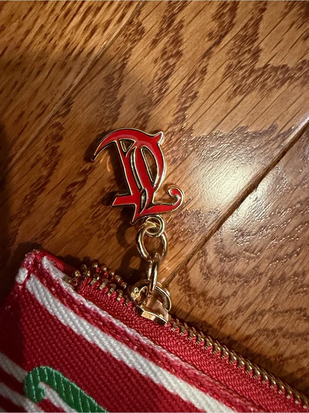 Juicy Couture  Strawberry Charm Zip Case and Red Striped Logo wallet. EXCLUSIVE